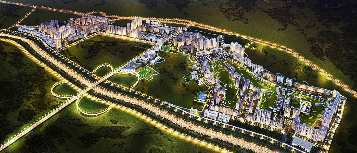 Jaypee Greens_an aerial view of a city at night